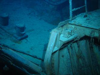 Aft end of hinge mechanism for concealment of stbd fwd 5.9-inch gun